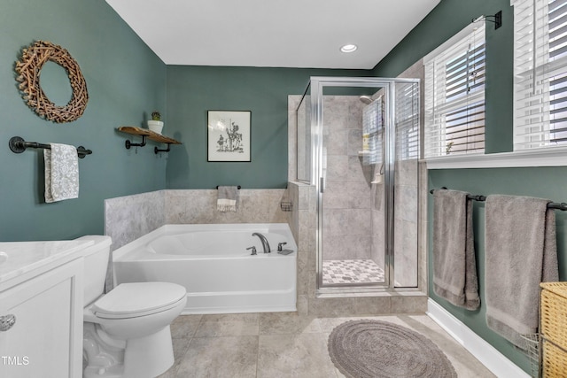 533 Duchart Ln, Fuquay Varina, NC 27526 - full bath featuring a bath, a stall shower, toilet, and vanity