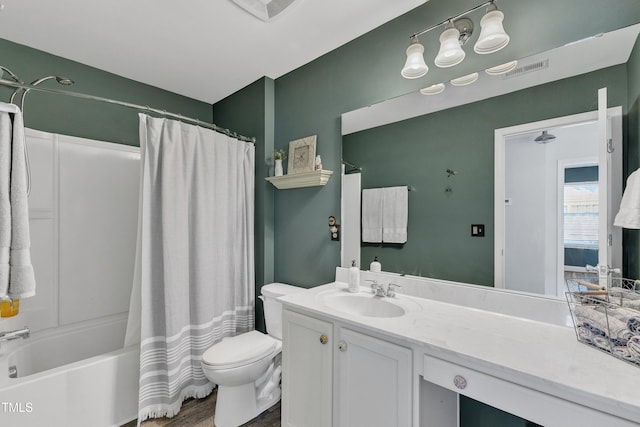 533 Duchart Ln, Fuquay Varina, NC 27526 - full bathroom with vanity, toilet, shower / bath combination with curtain, and wood finished floors