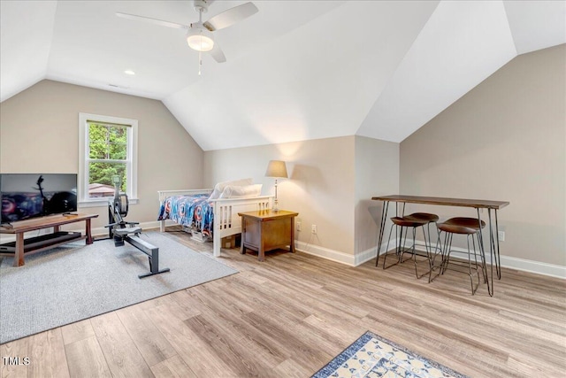 1779 Walter Grissom Rd, Kittrell, NC 27544 - workout room with wood finished floors, vaulted ceiling, baseboards, and ceiling fan