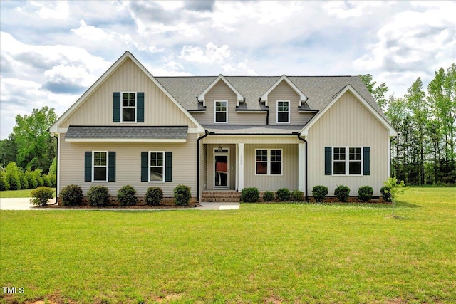1779 Walter Grissom Rd, Kittrell, NC 27544 - view of front facade featuring a shingled roof, a porch, a front yard, and crawl space