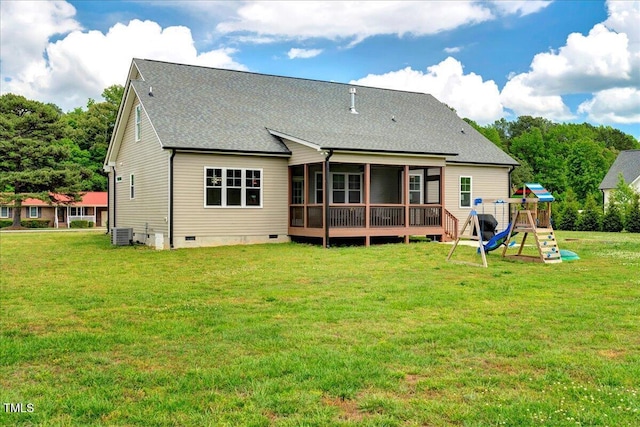 1779 Walter Grissom Rd, Kittrell, NC 27544 - rear view of house featuring a playground, a sunroom, crawl space, a yard, and a shingled roof