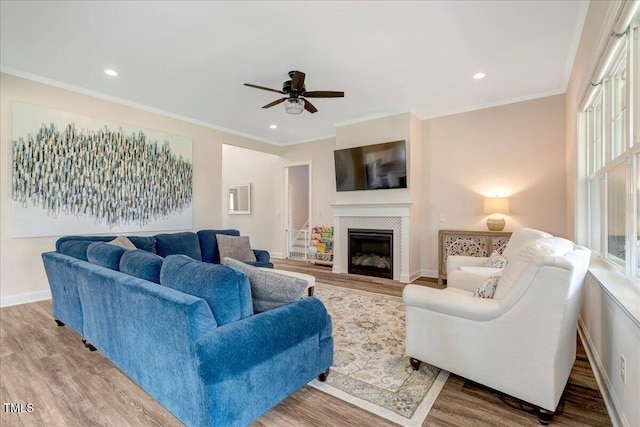 1779 Walter Grissom Rd, Kittrell, NC 27544 - living area featuring ceiling fan, wood finished floors, crown molding, recessed lighting, and a fireplace