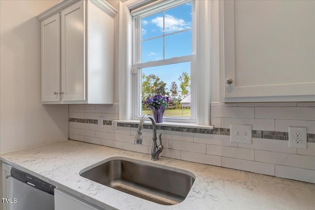 1779 Walter Grissom Rd, Kittrell, NC 27544 - kitchen with a sink, dishwasher, backsplash, and healthy amount of natural light