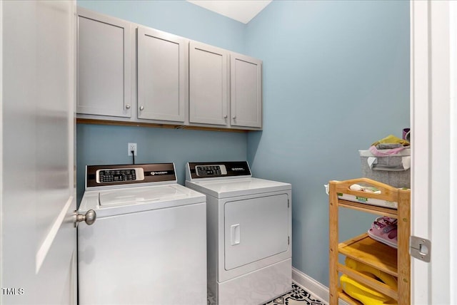 1779 Walter Grissom Rd, Kittrell, NC 27544 - washroom with cabinet space, washing machine and clothes dryer, and baseboards