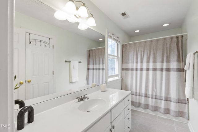 102 W Hill Dr, Cary, NC 27519 - bathroom with vanity, tile patterned flooring, recessed lighting, and shower / bath combo
