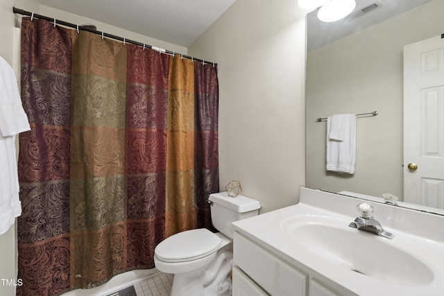 102 W Hill Dr, Cary, NC 27519 - full bath featuring toilet, vanity, tile patterned flooring, and a shower with shower curtain