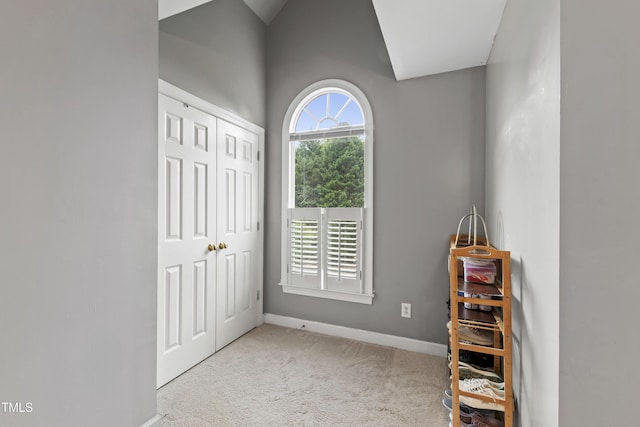102 W Hill Dr, Cary, NC 27519 - bedroom with carpet flooring, baseboards, a closet, and lofted ceiling