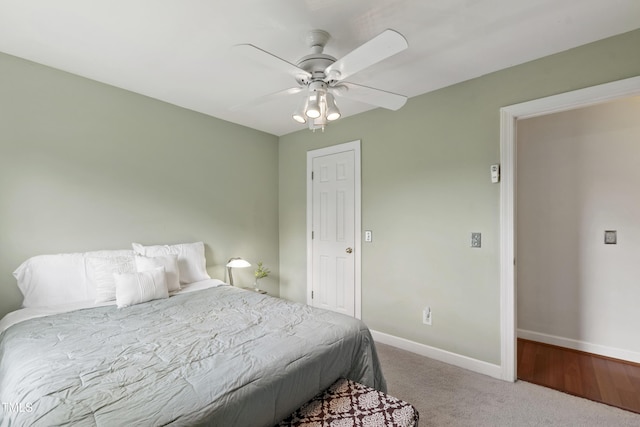 102 W Hill Dr, Cary, NC 27519 - carpeted bedroom featuring baseboards and a ceiling fan