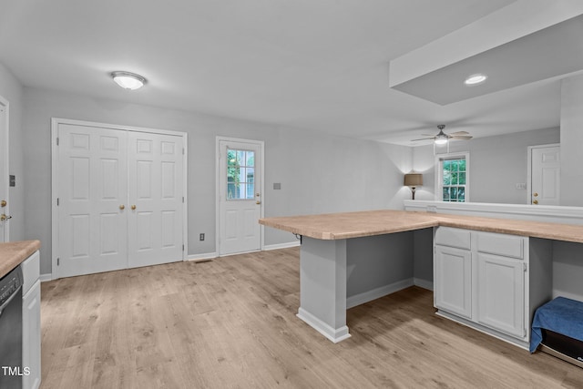 627 Gaslight Trl, Wendell, NC 27591 - kitchen with light countertops, a ceiling fan, and plenty of natural light