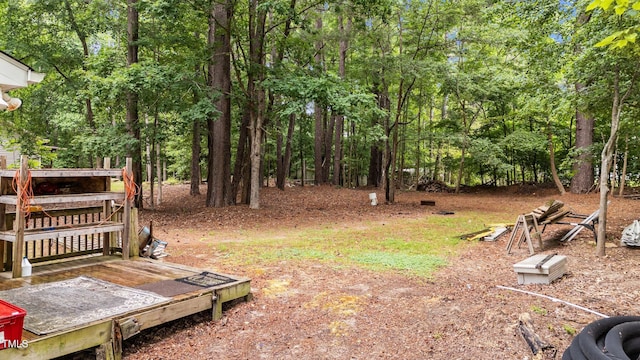 627 Gaslight Trl, Wendell, NC 27591 - view of yard with a wooden deck and view of scattered trees