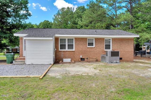 101 Apollo Cir, Roanoke Rapids, NC 27870 - back of property with crawl space, central AC, and brick siding