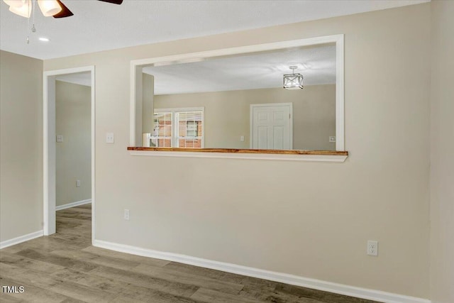 101 Apollo Cir, Roanoke Rapids, NC 27870 - unfurnished room featuring a ceiling fan, wood finished floors, baseboards, and recessed lighting