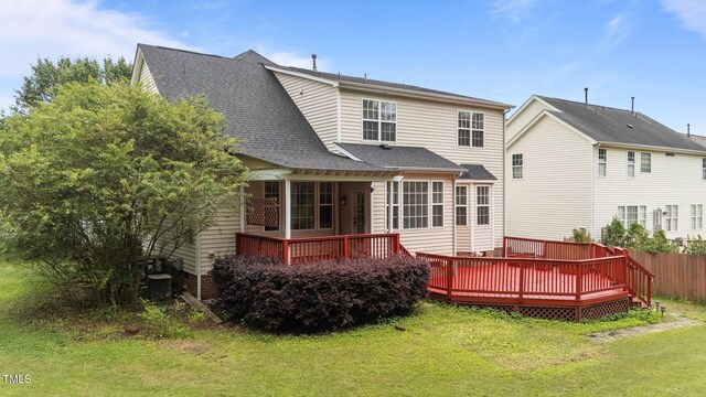 1604 Carnation Dr, Durham, NC 27703 - back of house with a wooden deck, roof with shingles, and cooling unit