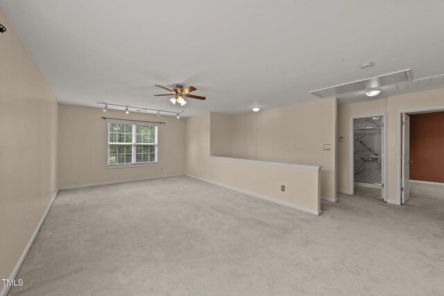 1604 Carnation Dr, Durham, NC 27703 - unfurnished room with attic access, light colored carpet, ceiling fan, and baseboards