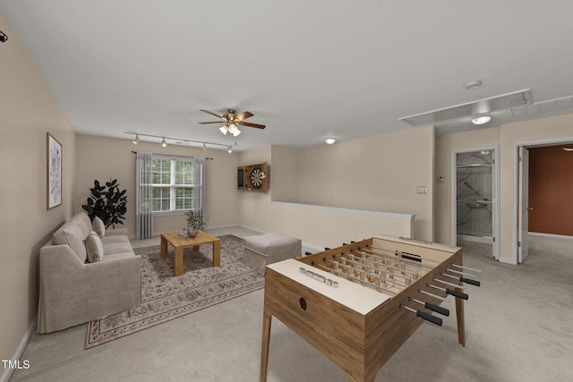 1604 Carnation Dr, Durham, NC 27703 - carpeted living area featuring attic access, ceiling fan, baseboards, and track lighting