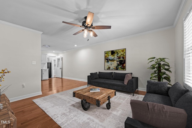 301 Williamson St, Burlington, NC 27215 - living area with light wood-style flooring, a ceiling fan, ornamental molding, recessed lighting, and plenty of natural light