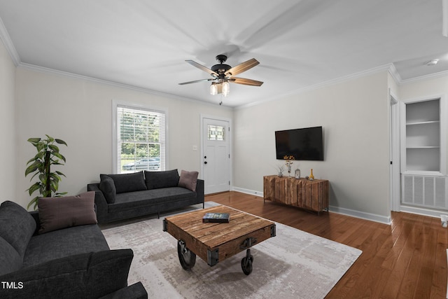 301 Williamson St, Burlington, NC 27215 - living area with wood finished floors, ornamental molding, and a ceiling fan