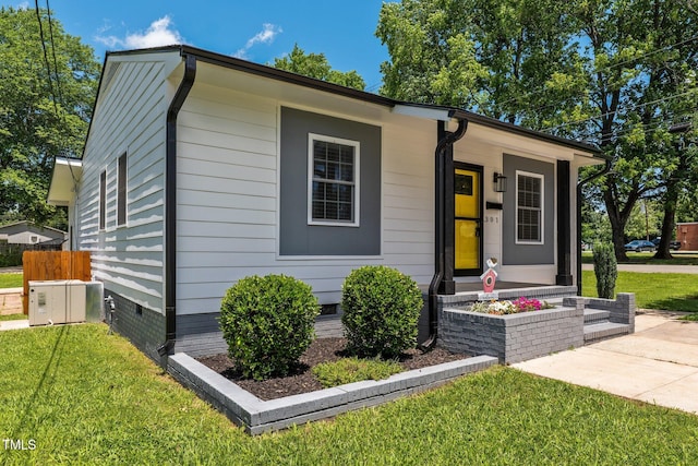 301 Williamson St, Burlington, NC 27215 - view of front of property with crawl space, a front yard, and covered porch