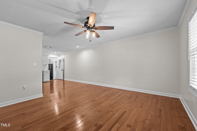 301 Williamson St, Burlington, NC 27215 - spare room featuring a ceiling fan, hardwood / wood-style flooring, ornamental molding, and recessed lighting