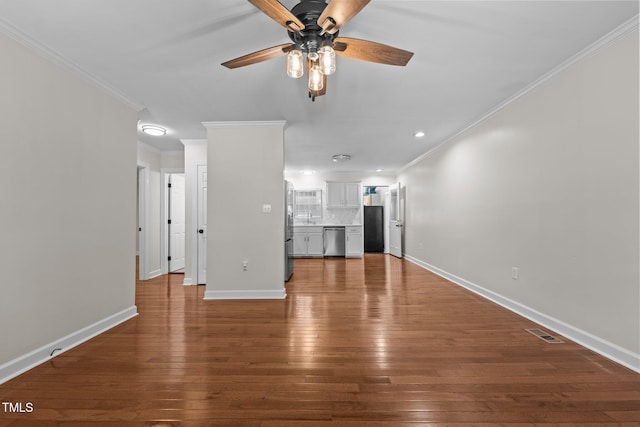 301 Williamson St, Burlington, NC 27215 - unfurnished living room featuring ceiling fan, hardwood / wood-style floors, ornamental molding, and recessed lighting