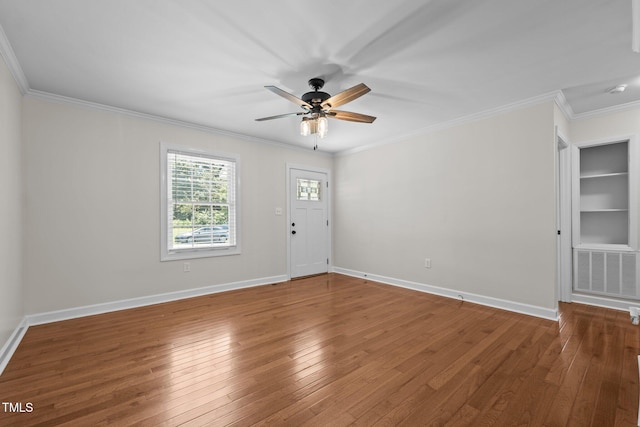 301 Williamson St, Burlington, NC 27215 - foyer entrance with ceiling fan, ornamental molding, and wood-type flooring