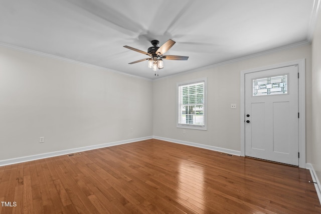 301 Williamson St, Burlington, NC 27215 - entrance foyer featuring healthy amount of natural light, a ceiling fan, hardwood / wood-style flooring, and crown molding