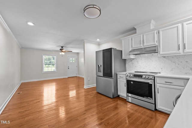 301 Williamson St, Burlington, NC 27215 - kitchen with stainless steel appliances, under cabinet range hood, a ceiling fan, light countertops, and crown molding