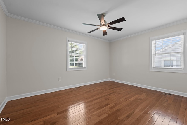 301 Williamson St, Burlington, NC 27215 - empty room with dark wood-type flooring, crown molding, and a ceiling fan
