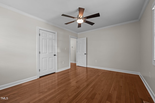 301 Williamson St, Burlington, NC 27215 - unfurnished bedroom with wood finished floors, ornamental molding, and ceiling fan