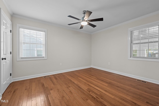 301 Williamson St, Burlington, NC 27215 - unfurnished room with hardwood / wood-style flooring, healthy amount of natural light, ornamental molding, and ceiling fan