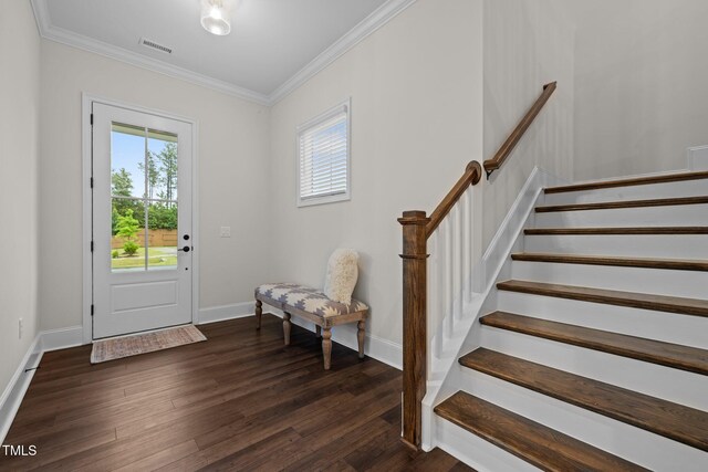 3053 Roy Ct, Apex, NC 27523 - foyer entrance with plenty of natural light, crown molding, dark wood-style floors, and stairway