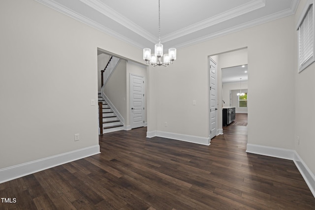 3053 Roy Ct, Apex, NC 27523 - empty room with a chandelier, stairs, dark wood-type flooring, and crown molding
