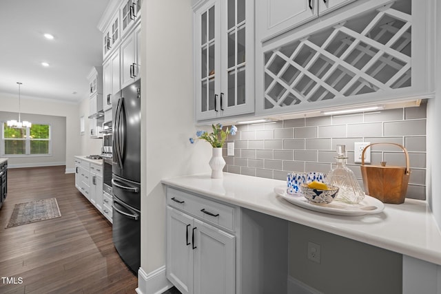 3053 Roy Ct, Apex, NC 27523 - kitchen featuring freestanding refrigerator, decorative backsplash, white cabinetry, glass insert cabinets, and recessed lighting