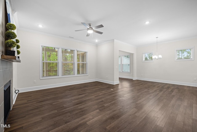 3053 Roy Ct, Apex, NC 27523 - unfurnished living room with a chandelier, dark wood-style floors, ceiling fan, a fireplace, and ornamental molding