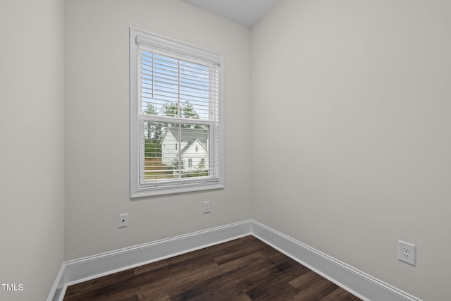 3053 Roy Ct, Apex, NC 27523 - spare room with dark wood-type flooring and baseboards
