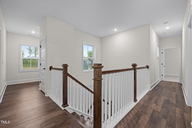 3053 Roy Ct, Apex, NC 27523 - hall with an upstairs landing, healthy amount of natural light, dark wood-style floors, and recessed lighting