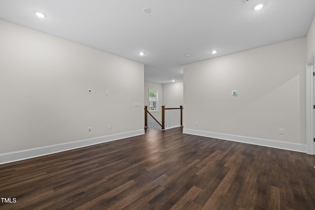 3053 Roy Ct, Apex, NC 27523 - unfurnished room with dark wood-type flooring and recessed lighting