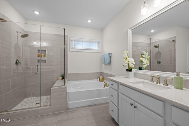 3053 Roy Ct, Apex, NC 27523 - full bath with a bath, a stall shower, vanity, tile patterned floors, and recessed lighting