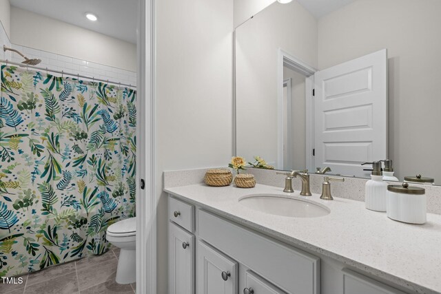 3053 Roy Ct, Apex, NC 27523 - bathroom with vanity, a shower with shower curtain, and tile patterned floors