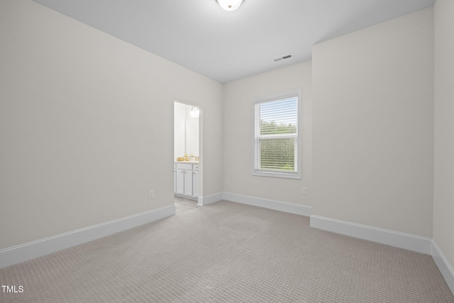 3053 Roy Ct, Apex, NC 27523 - spare room featuring light colored carpet and baseboards