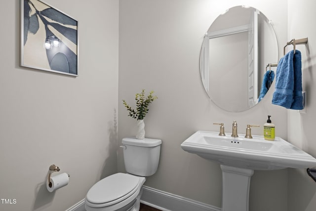 3053 Roy Ct, Apex, NC 27523 - bathroom featuring toilet and baseboards