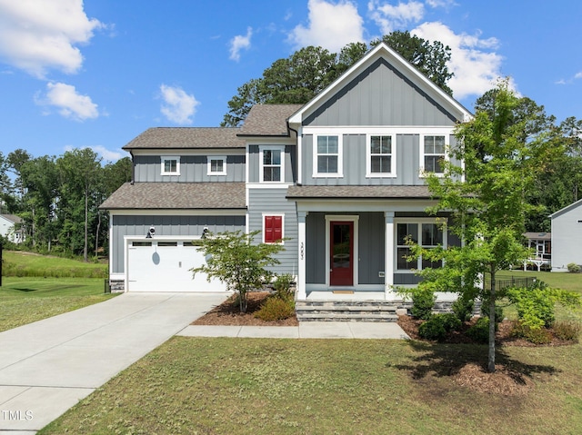 3053 Roy Ct, Apex, NC 27523 - view of front facade with board and batten siding, a front yard, and driveway