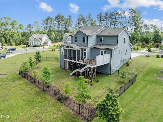 3053 Roy Ct, Apex, NC 27523 - back of house with roof with shingles, a deck, and view of scattered trees