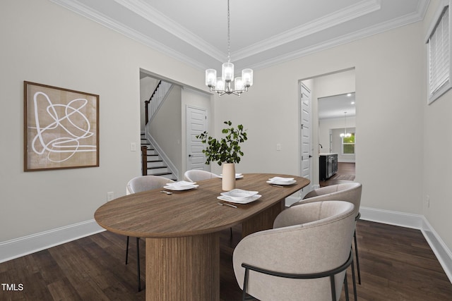 3053 Roy Ct, Apex, NC 27523 - dining area featuring a chandelier, dark wood finished floors, stairs, and ornamental molding