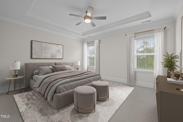 3053 Roy Ct, Apex, NC 27523 - carpeted bedroom with a raised ceiling, ornamental molding, and ceiling fan