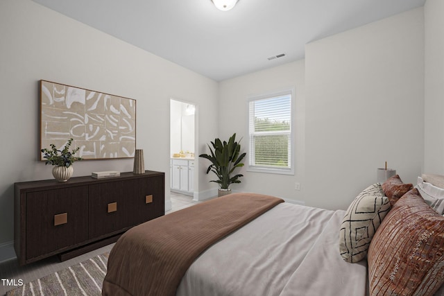 3053 Roy Ct, Apex, NC 27523 - bedroom with baseboards and ensuite bathroom