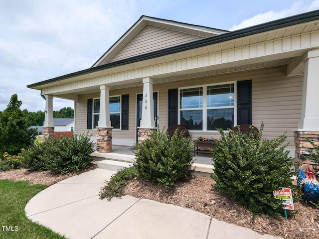 286 Beaver Tavern Dr, Benson, NC 27504 - view of front of home featuring covered porch and stone siding