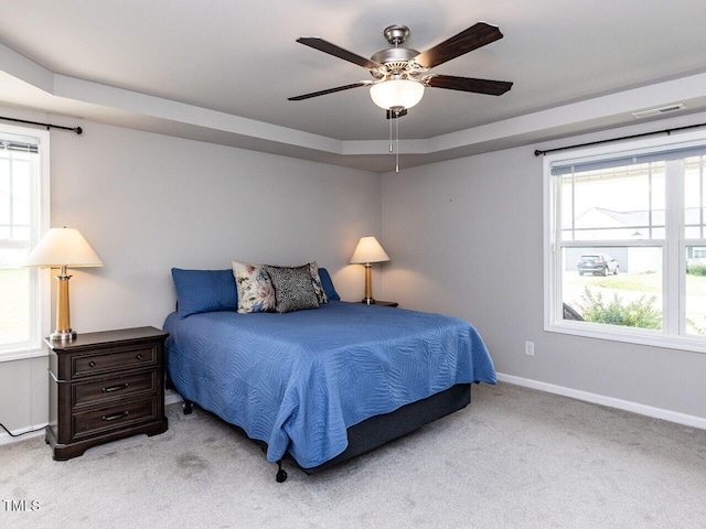 286 Beaver Tavern Dr, Benson, NC 27504 - bedroom with carpet, multiple windows, baseboards, and ceiling fan