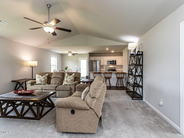 286 Beaver Tavern Dr, Benson, NC 27504 - living room featuring vaulted ceiling, ceiling fan, light colored carpet, and baseboards