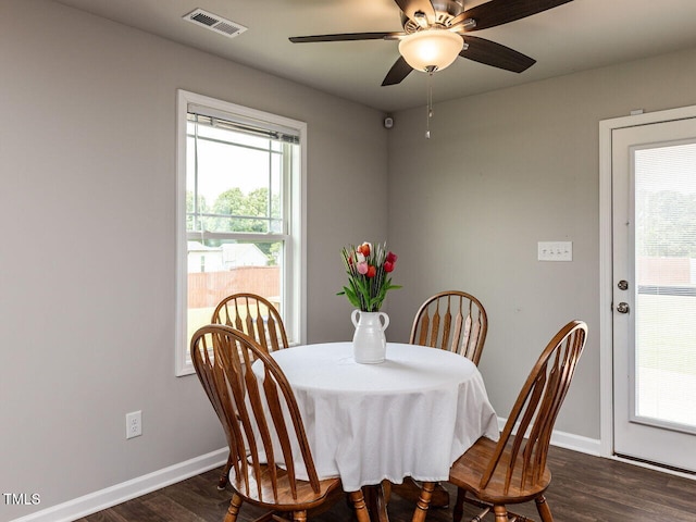 286 Beaver Tavern Dr, Benson, NC 27504 - dining area with a ceiling fan, plenty of natural light, dark wood-type flooring, and baseboards